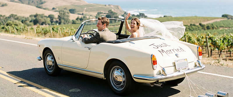 Married couple driving in a car