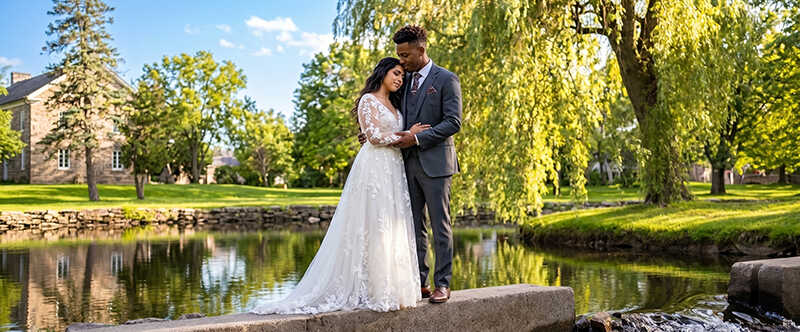 A couple getting married in Stewart Park, Perth Ontario